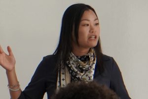 A Photo of Associate Professor Sherry Yu teaching a class.
